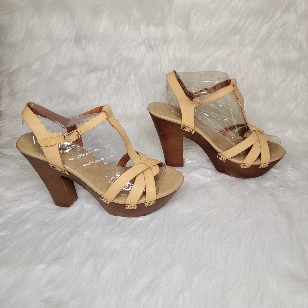 Brown platform heel sandal.